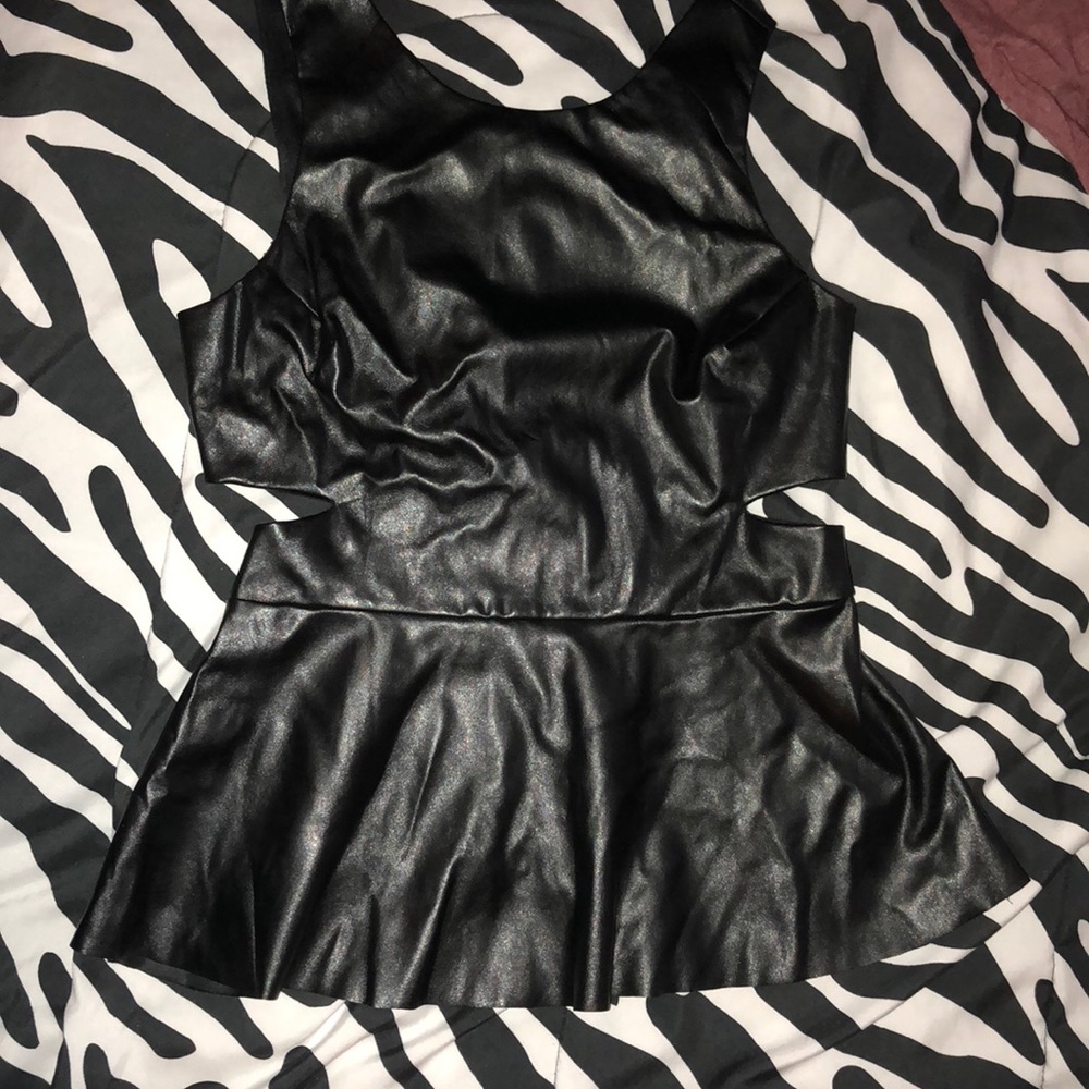 Black leather blouse with small cut out on sides